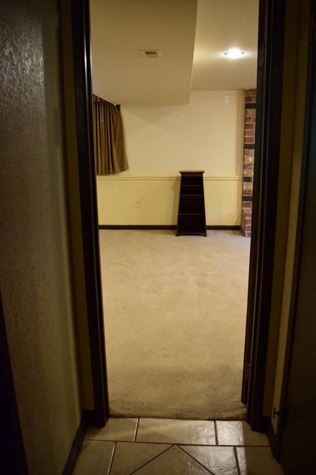 downstairs hallway view to rec room via doorway