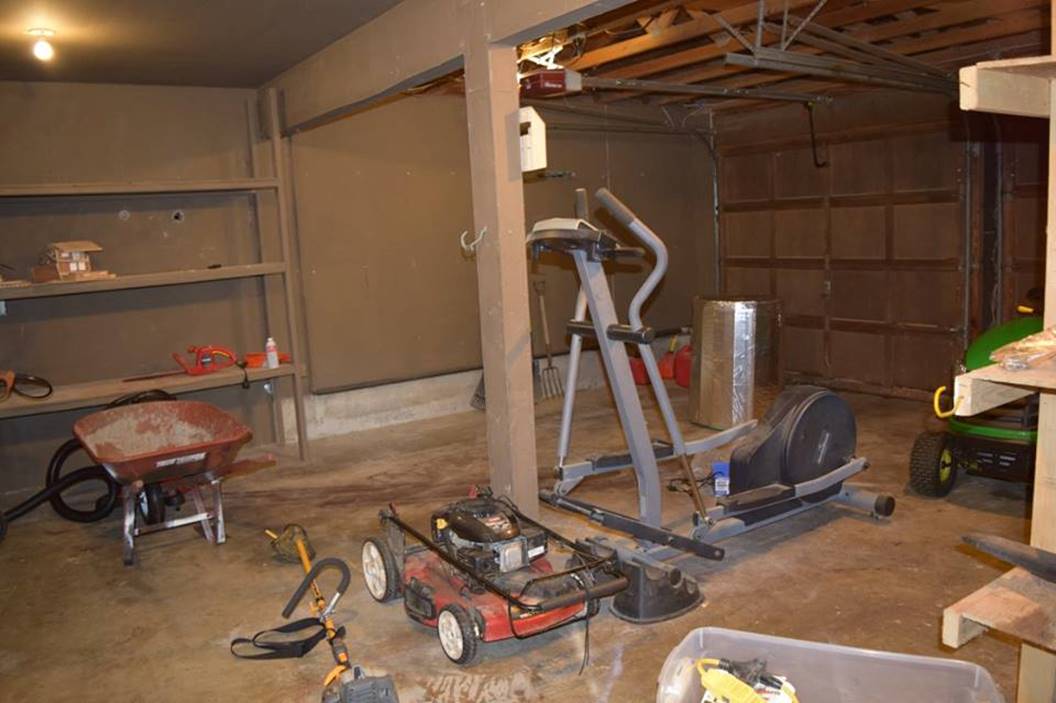 garage with yard equip and stairclimber